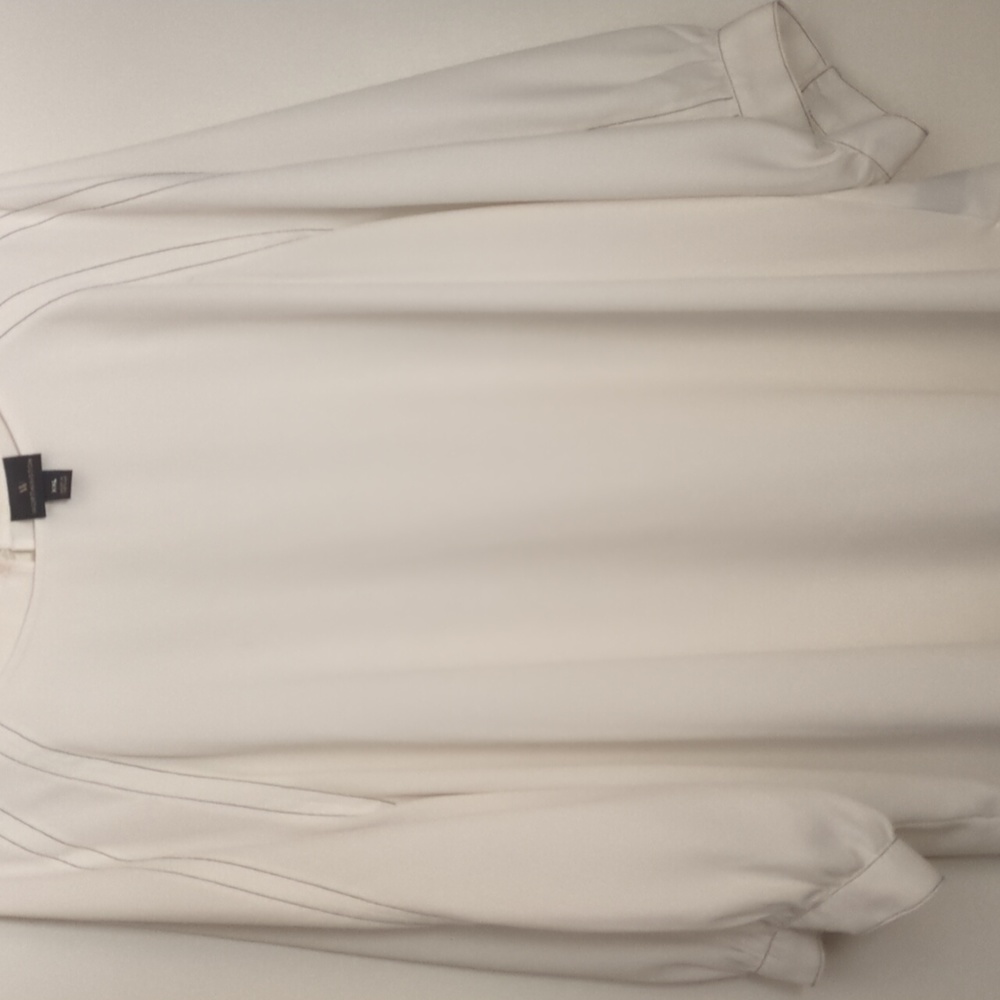 3/4 sleeve white with black pin stripe accents.